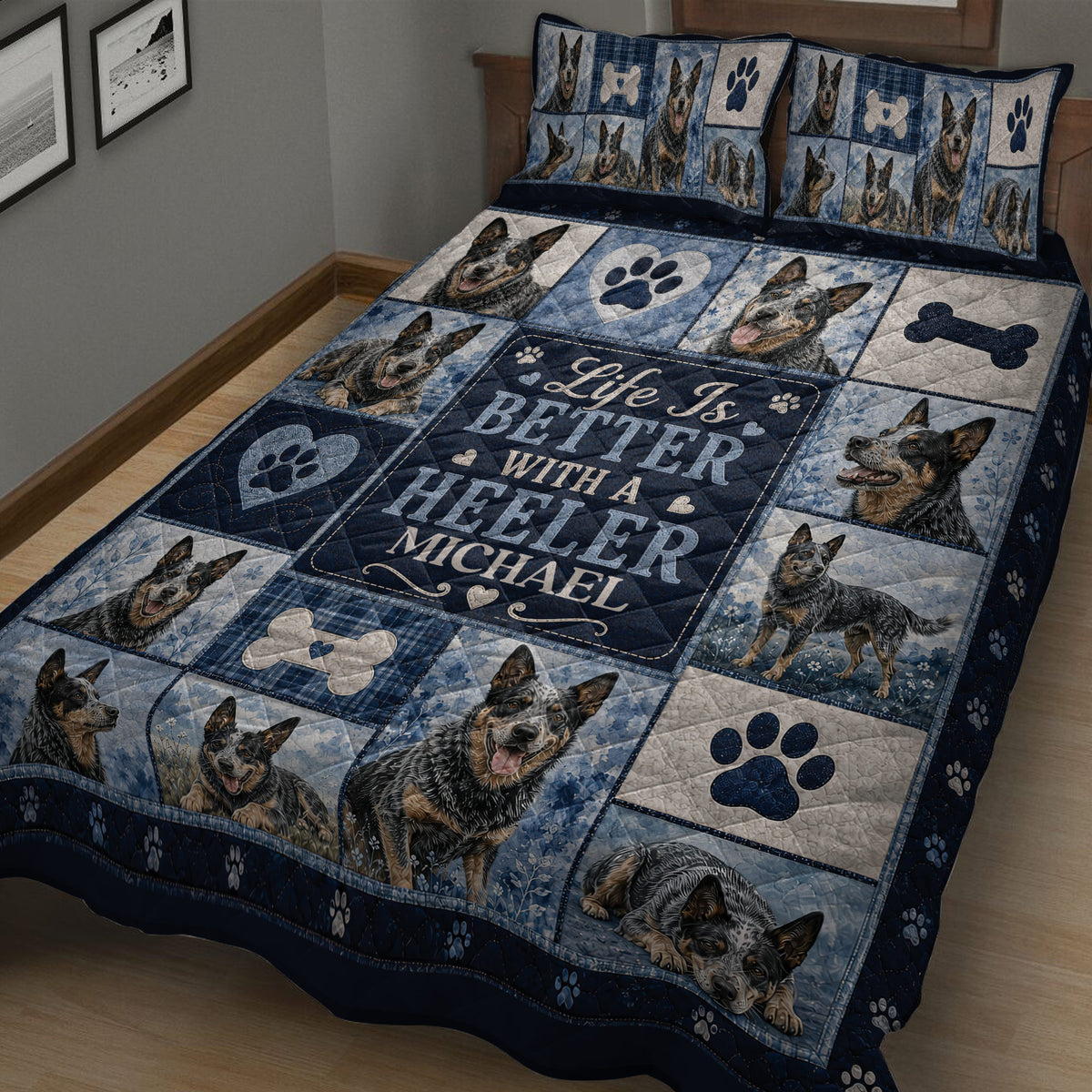 Close view of Australian Cattle Dog quilt blanket with blue panels, hearts, bones, and paw print artwork