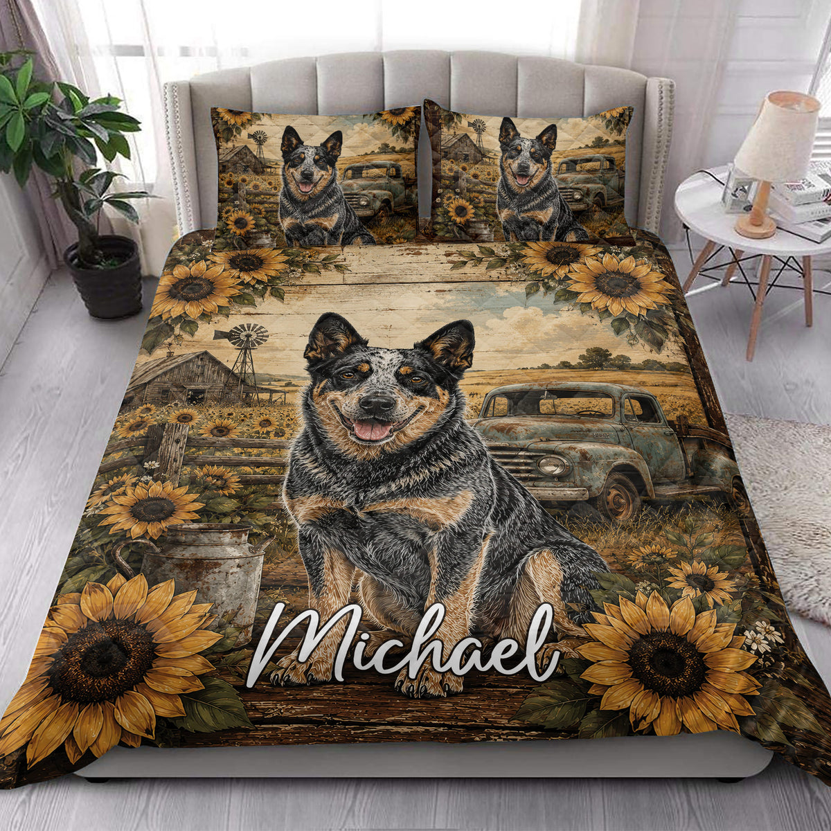 Australian Cattle Dog quilt blanket styled in a bright bedroom with sunflower and rustic farmhouse artwork