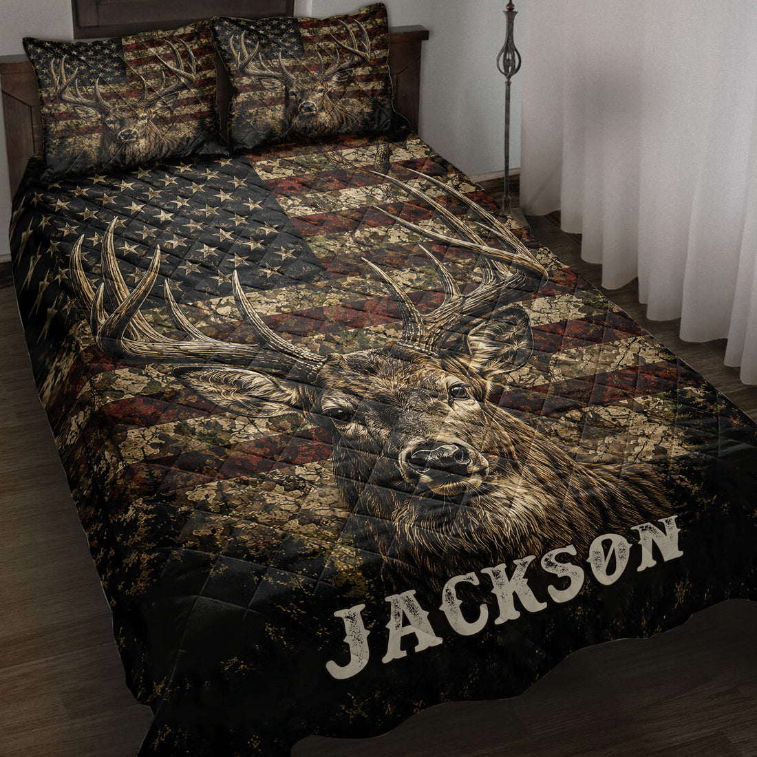 Deer quilt blanket displayed on a bed with detailed buck artwork, antlers, stars, and rustic patriotic colors