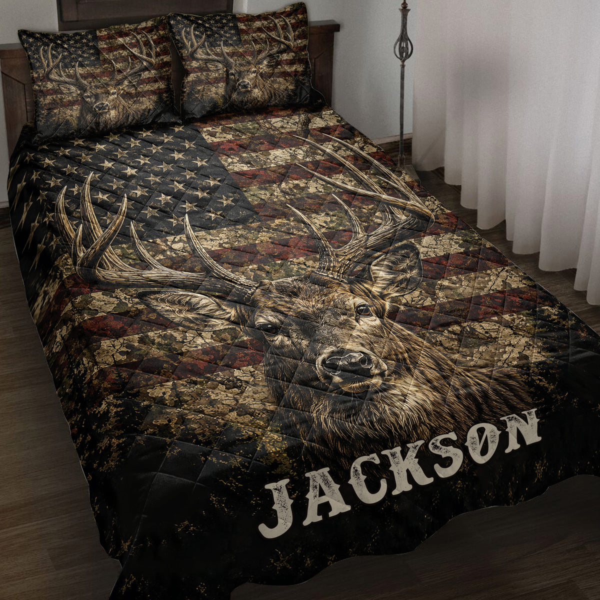 Deer quilt blanket displayed on a bed with detailed buck artwork, antlers, stars, and rustic patriotic colors