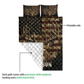 Deer quilt blanket detail showing the printed front, quilted backing, and large buck artwork