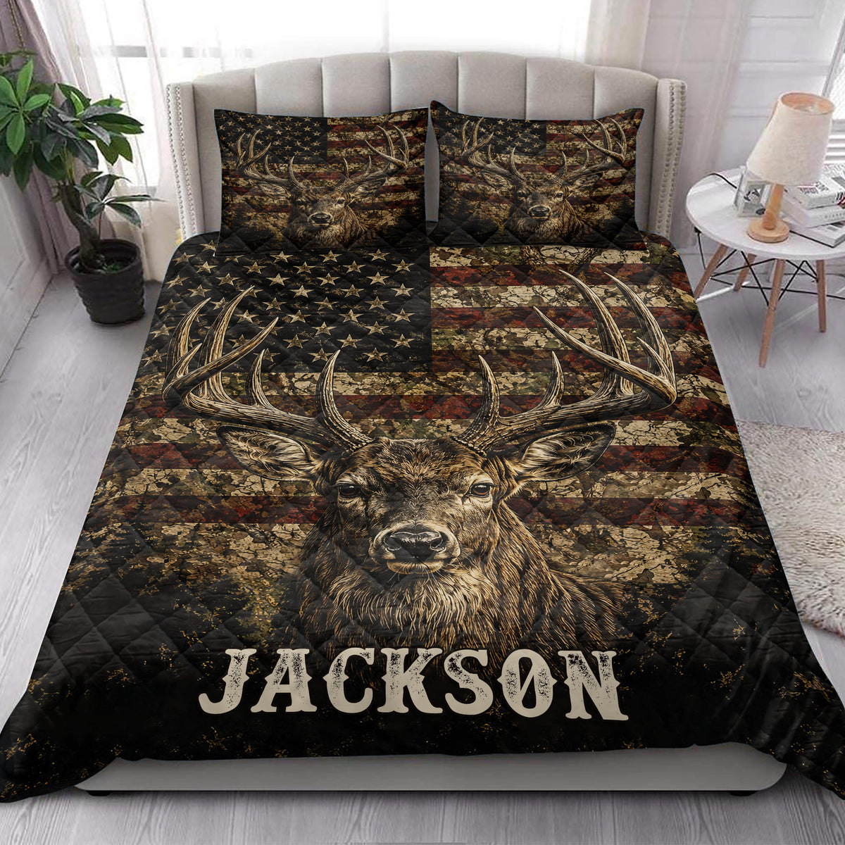 Rustic deer quilt blanket styled in a bright bedroom with large buck artwork and matching printed pillowcases