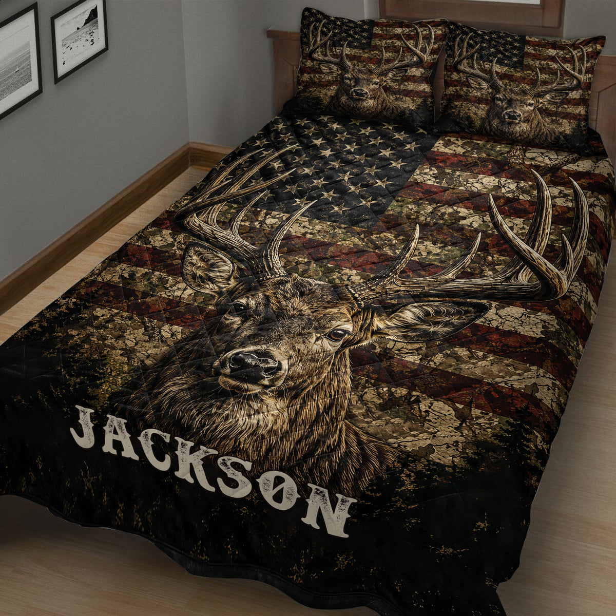 Close bedroom view of a deer quilt blanket featuring a detailed buck portrait, antlers, stars, and earthy tones