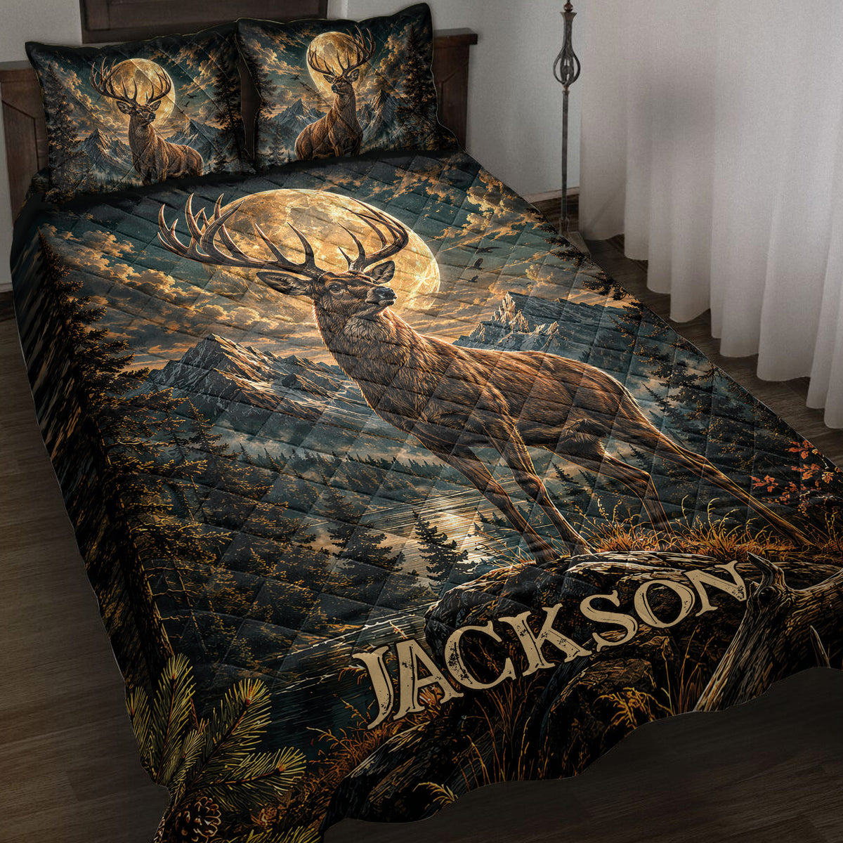 Deer quilt blanket displayed on a bed with moonlit mountains, pine trees, and rustic wilderness artwork