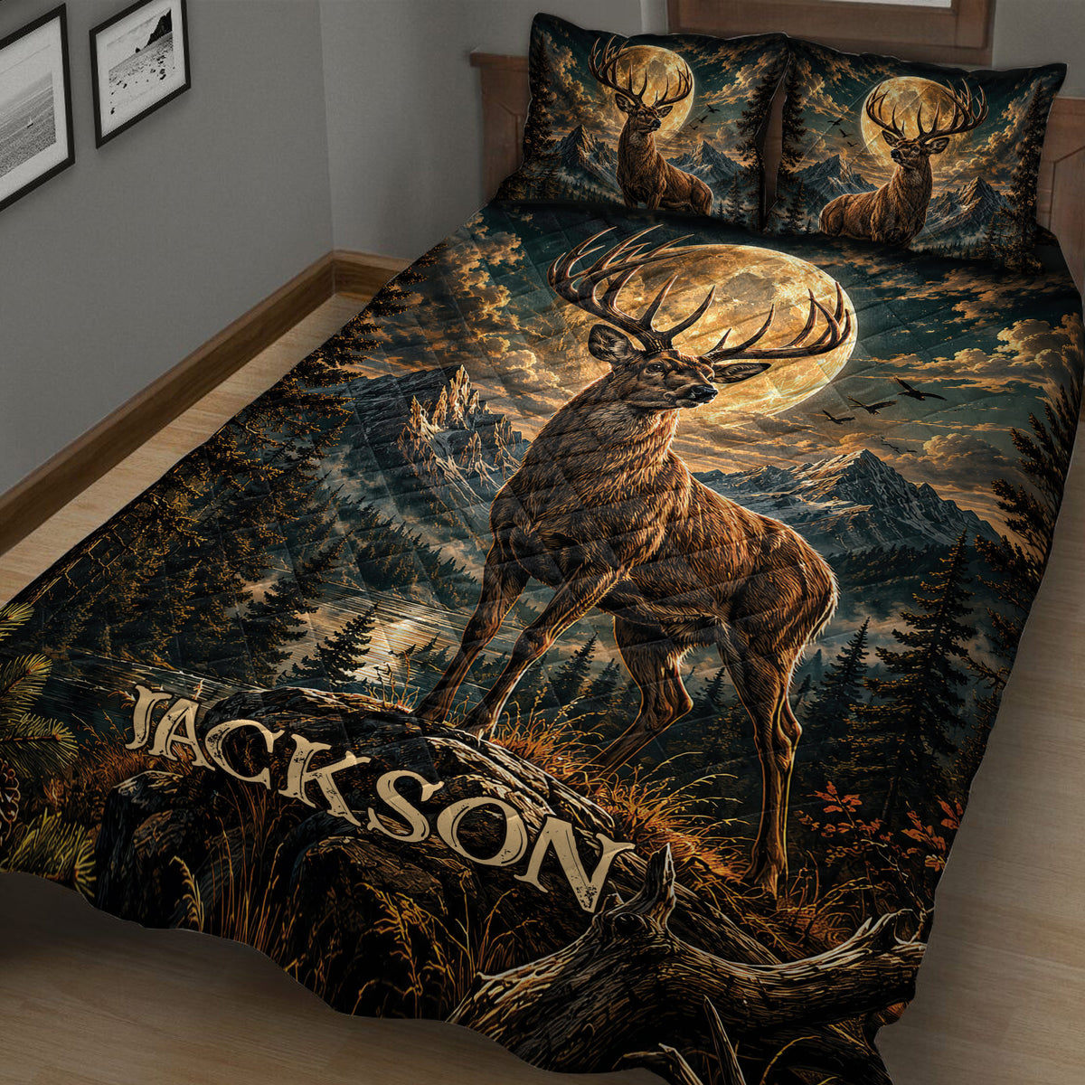 Rustic deer quilt blanket spread across a bed with woodland, mountain, and golden moon artwork