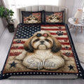 Shih Tzu quilt bedding styled in a bright bedroom with a large dog portrait and patriotic flag design