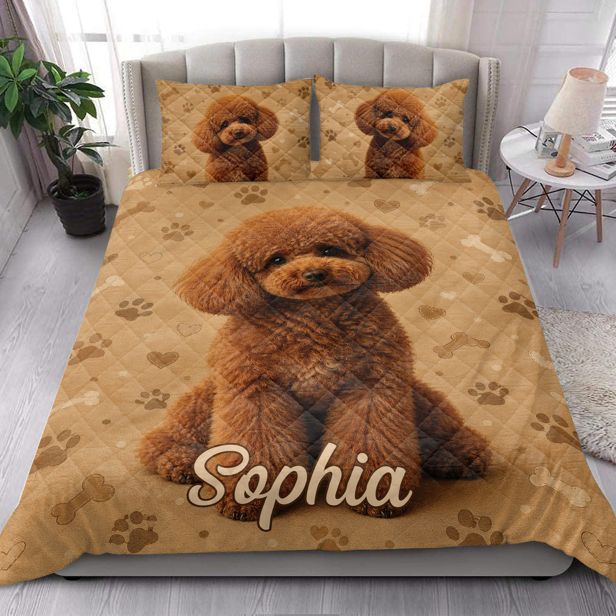 Poodle quilt bedding styled in a bright bedroom with a large dog portrait and matching pillows
