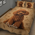 Brown poodle quilt blanket displayed across a bed with dog portraits, paw prints, hearts, and bones
