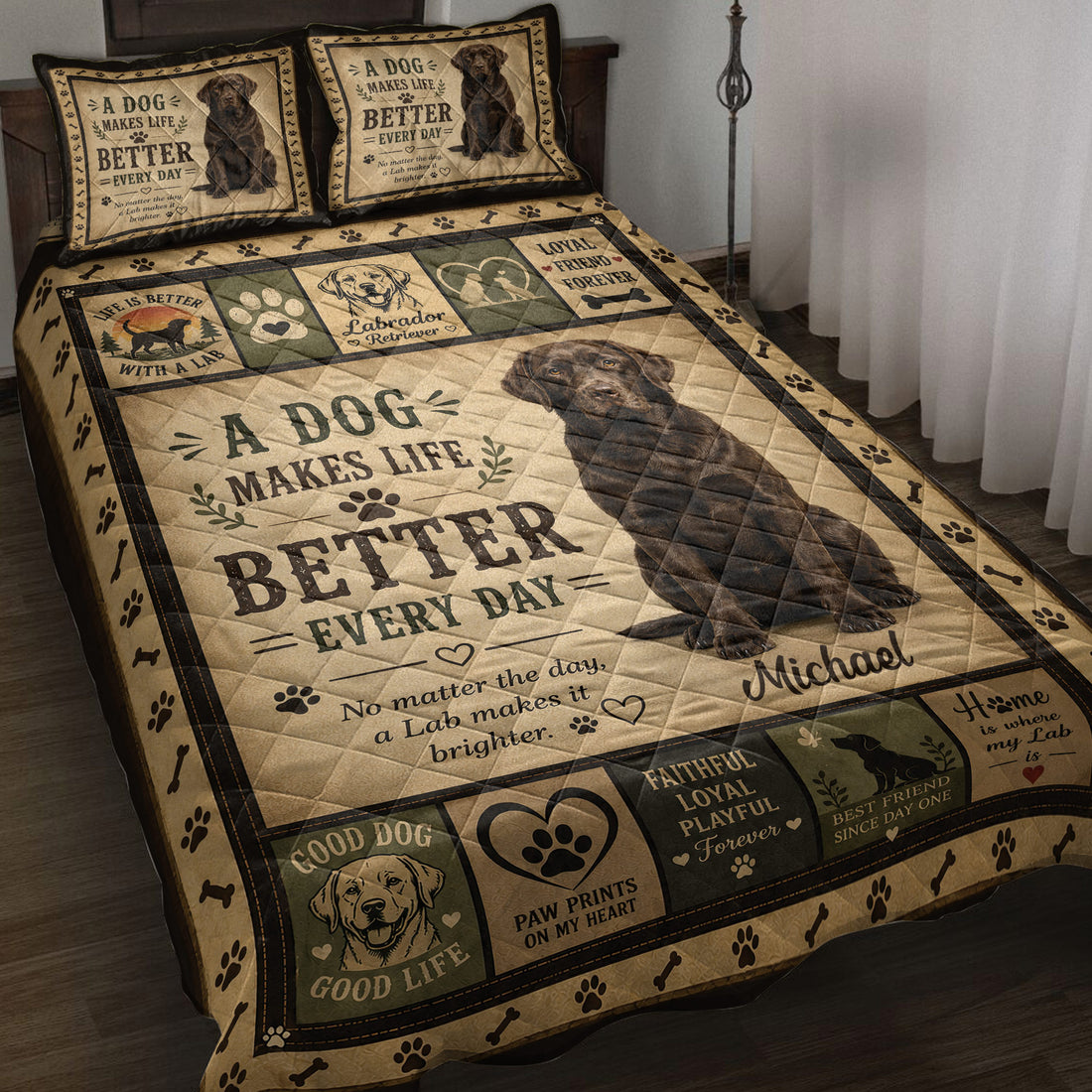 Labrador Retriever quilt blanket displayed on a bed with dog portraits, paw prints, bones, and rustic tan artwork