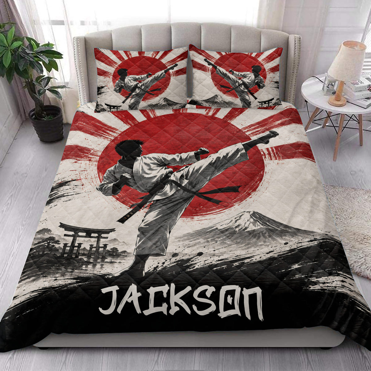 Karate quilt bedding styled in a bright bedroom with martial artist artwork and bold red, white, and black colors
