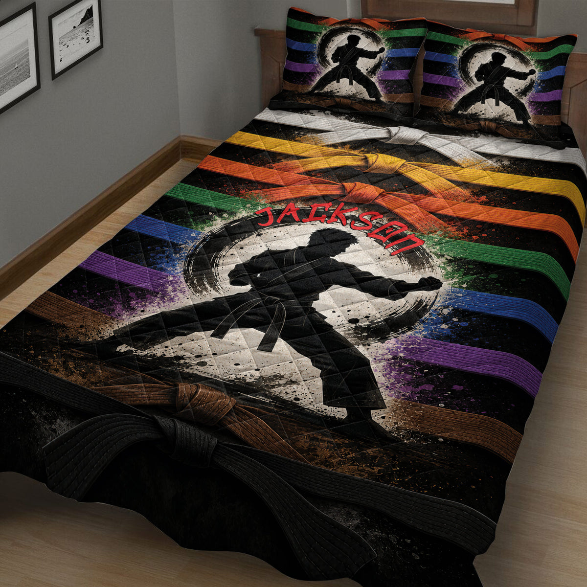 Close bedroom view of a karate quilt blanket featuring a martial artist silhouette and vibrant belt colors