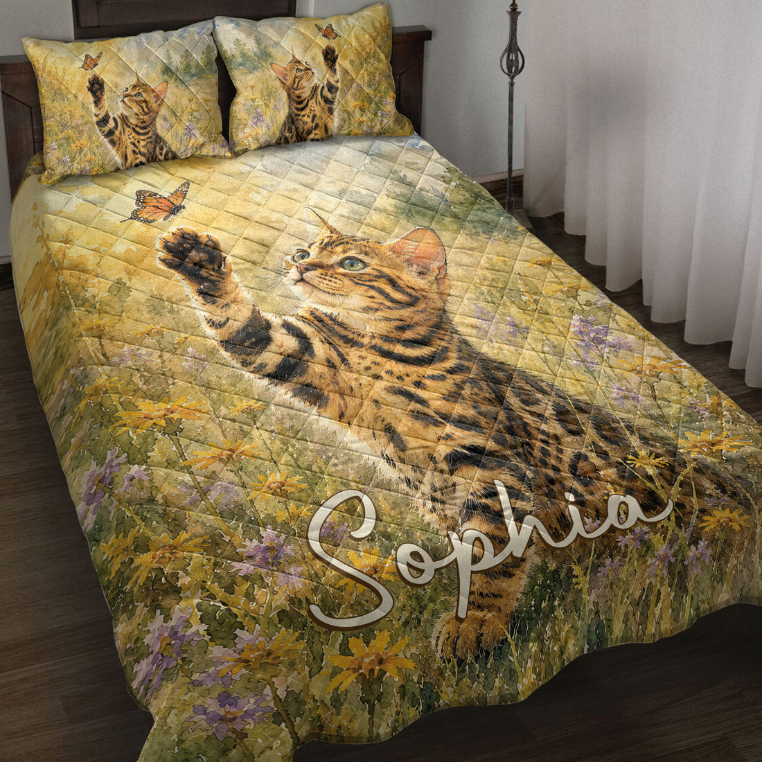 Bengal cat quilt blanket spread across a bed with butterflies and wildflower meadow artwork