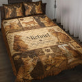 Bengal cat quilt blanket displayed on a bed with sepia patchwork artwork, paw prints, hearts, and cat portraits