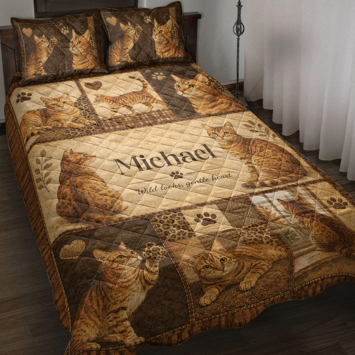 Bengal cat quilt blanket displayed on a bed with sepia patchwork artwork, paw prints, hearts, and cat portraits