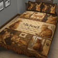 Close bedroom view of a Bengal cat quilt blanket featuring spotted cat portraits, paw prints, and rustic patchwork panels