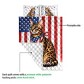 Bengal cat quilt showing the printed side and white quilted backing detail