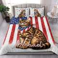 Bengal cat quilt blanket styled in a bright bedroom with matching cat artwork