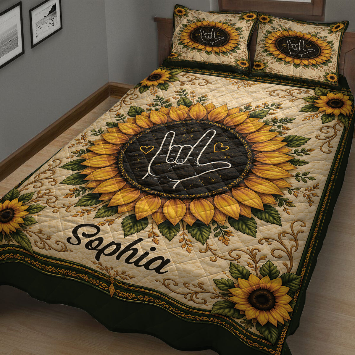Close view of a sign language hand gesture surrounded by golden sunflower artwork on a quilt