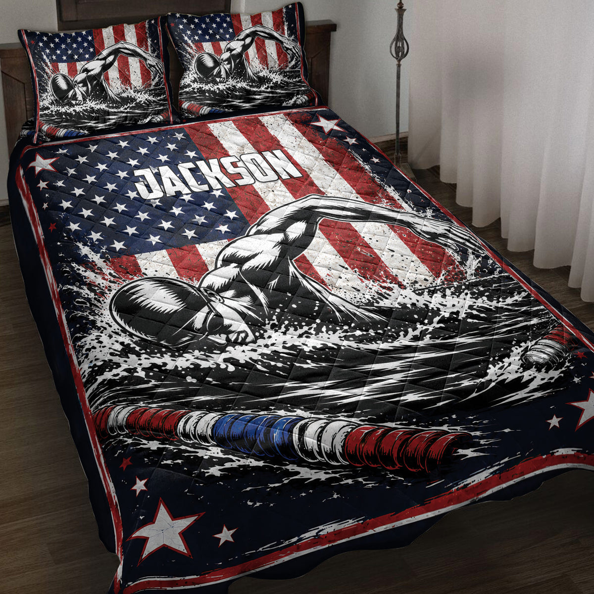 Swimming quilt blanket displayed on a bed with swimmer artwork, American flag colors, stars, and water splashes