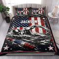 Swimming quilt bedding styled in a bright bedroom with swimmer artwork and patriotic red, white, and blue accents