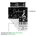 Piano quilt blanket detail showing the printed musical design, quilted texture, keyboard keys, and white backing