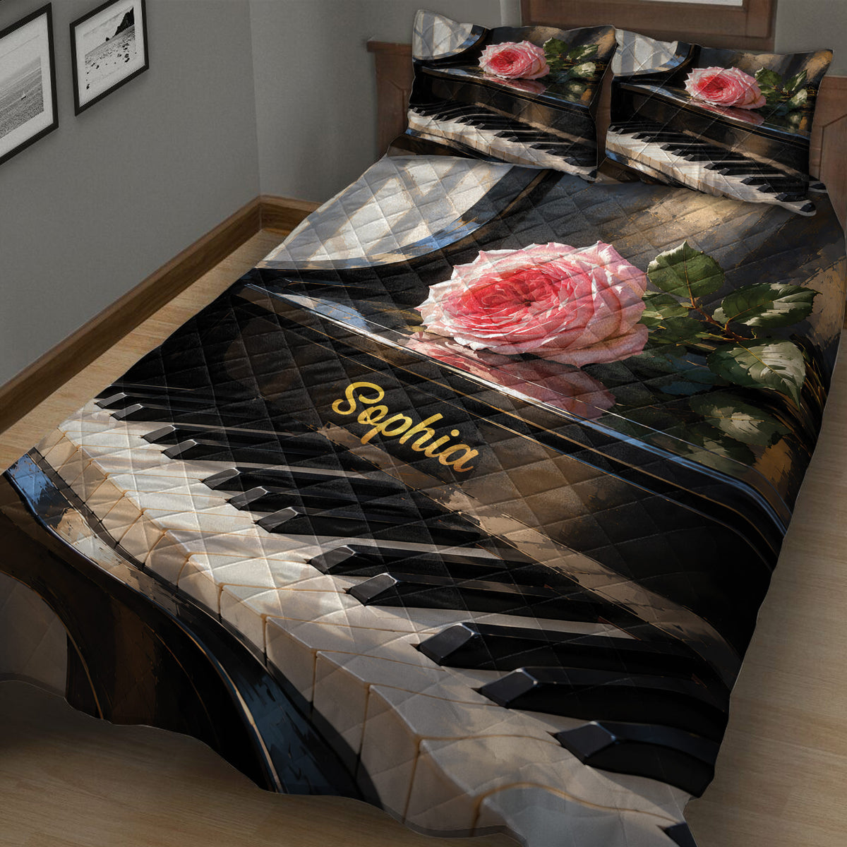 Close bedroom view of a piano quilt blanket featuring piano keys, a pink rose, and green leaves