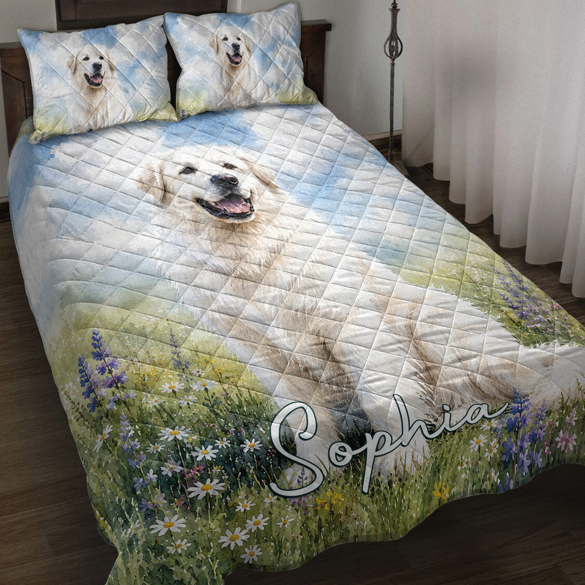 Great Pyrenees quilt blanket displayed on a bed with white dog artwork, blue tones, and wildflower borders
