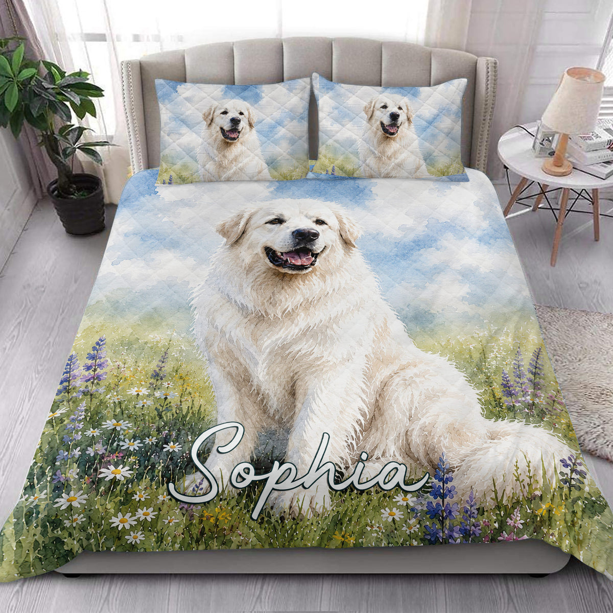 Great Pyrenees quilt bedding styled in a bright bedroom with meadow flowers and blue watercolor accents