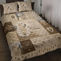 Great Pyrenees quilt blanket bedding set displayed on a bed with paw prints, mountain scenes, and dog artwork