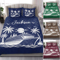 Cruise ship quilt blanket styled on a bed with tropical artwork shown in several colorways