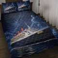 Cruise ship quilt bedding set displayed on a bed with dark ocean and starry sky artwork