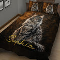 Close lifestyle view of a Maine Coon quilt blanket with bronze and charcoal cat artwork