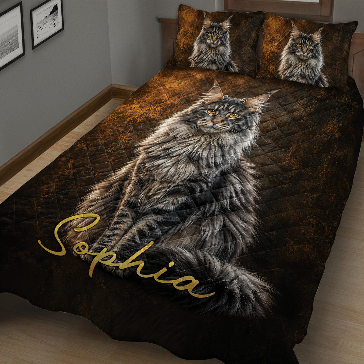 Close lifestyle view of a Maine Coon quilt blanket with bronze and charcoal cat artwork