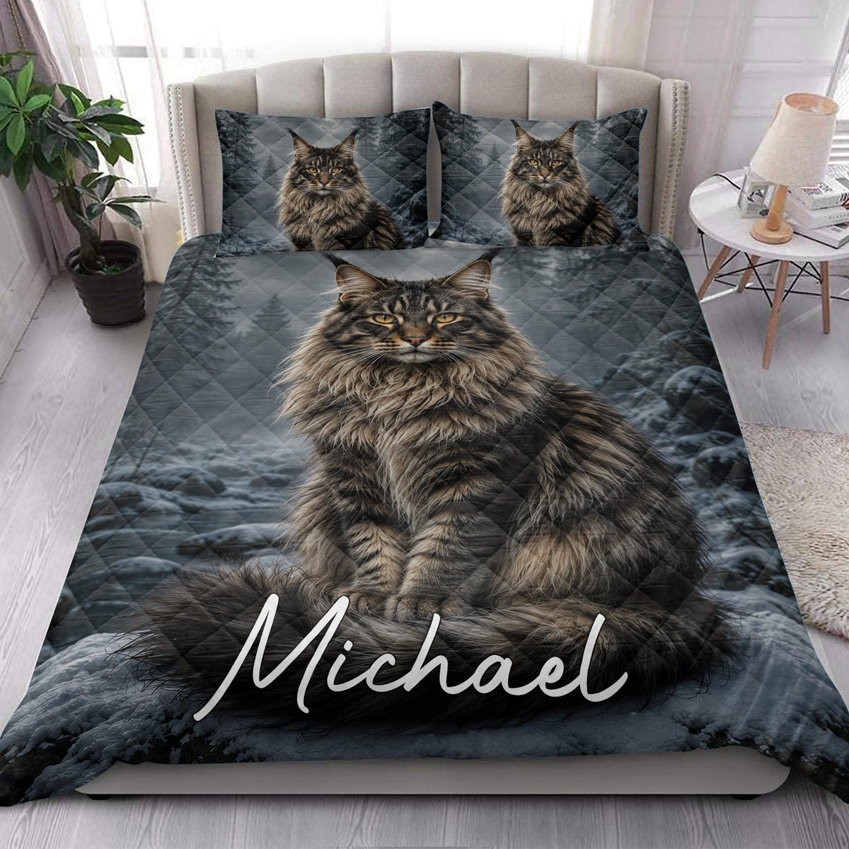 Maine Coon cat quilt blanket styled in a bright bedroom with matching cat artwork on the bed
