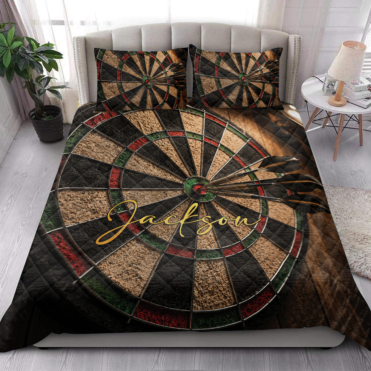 Dart board quilt blanket styled in a bright bedroom with matching dartboard pillow designs