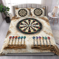 Dart board quilt blanket styled in a bright bedroom with dartboard pillows and colorful dart rows