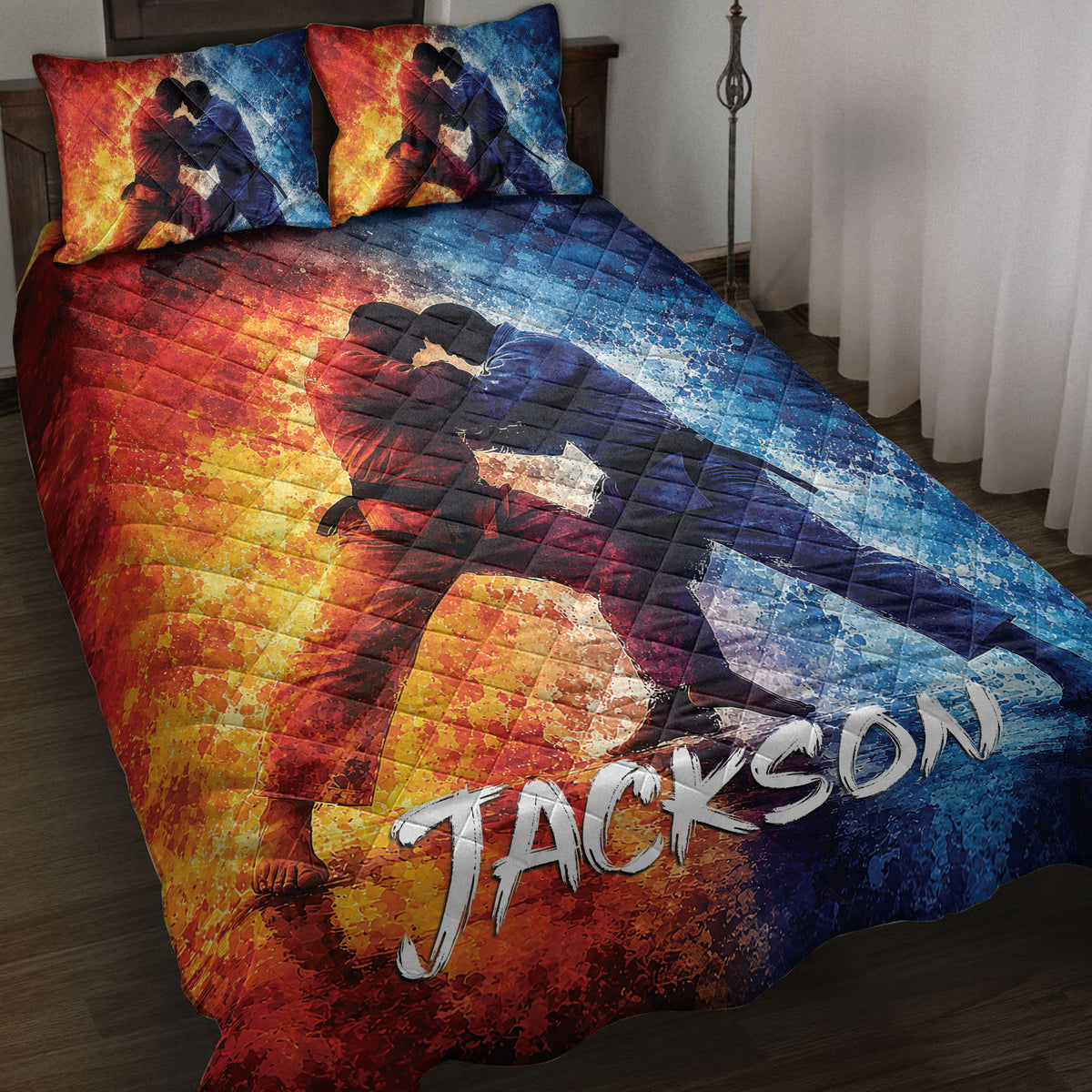 Jiu Jitsu quilt blanket displayed on a bed with two grapplers and vivid red, gold, blue, and black artwork