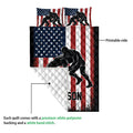 Wrestling quilt showing the printed patriotic design and white quilted backing