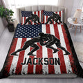 Wrestling quilt blanket styled in a bedroom with grappling wrestler artwork and flag colors