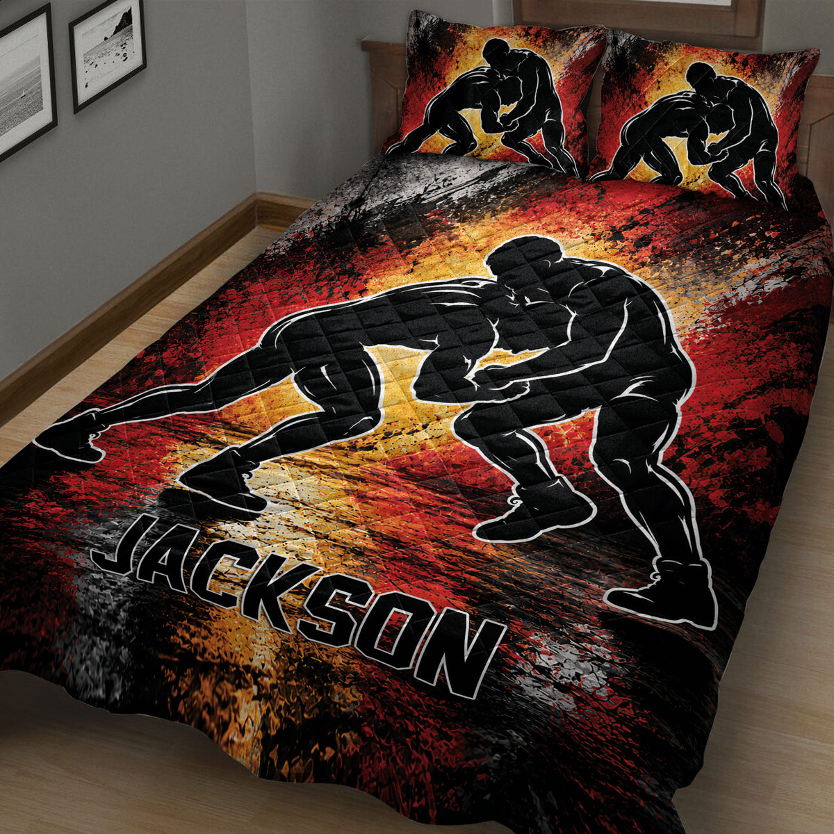 Wrestling quilt blanket displayed at an angle with large grappling silhouettes and dramatic abstract sports colors