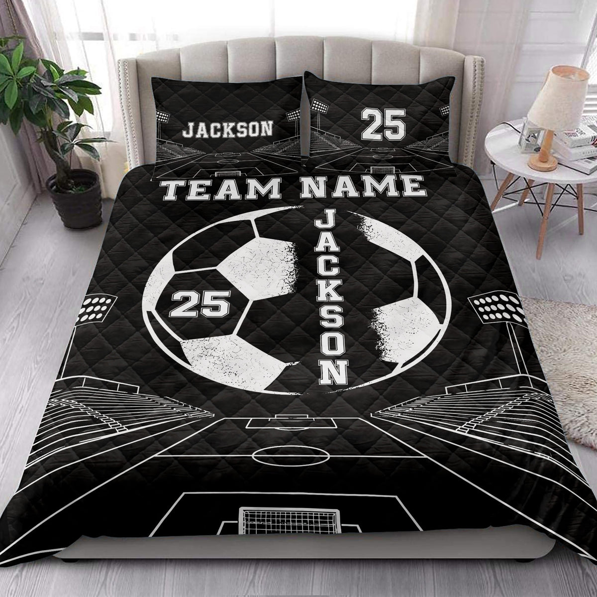 Black soccer quilt bedding set shown on a bedroom bed with white field lines and stadium illustrations