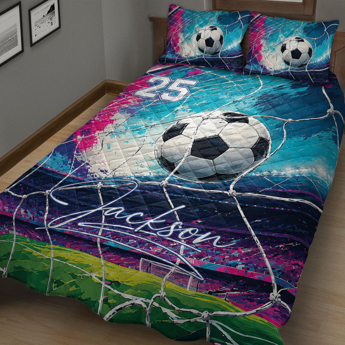 Close view of a soccer quilt blanket featuring a large soccer ball, net pattern, field, and vivid abstract colors