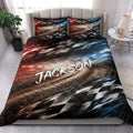 Racing quilt blanket styled in a bright bedroom with checkered flag graphics and dramatic track-inspired artwork