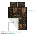 Dirt track racing quilt showing the printed side, quilted stitching and white backing detail