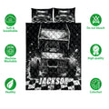 Dirt track racing quilt bedding set displayed with sprint car artwork and a bold black and white checkered design