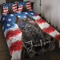Cane Corso quilt blanket displayed on a bed with patriotic stars, stripes, and aviator sunglasses artwork