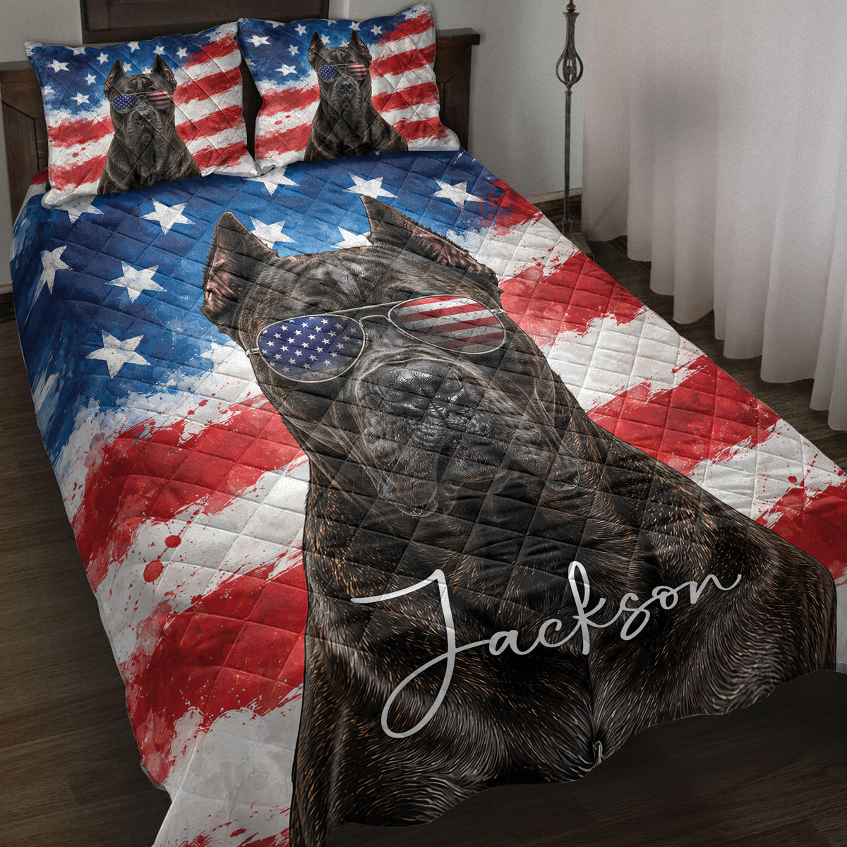 Cane Corso quilt blanket displayed on a bed with patriotic stars, stripes, and aviator sunglasses artwork