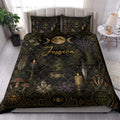 Wiccan quilt blanket styled in a bright bedroom with moon phases, crystals, candles, herbs, and mystical artwork