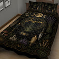 Close bedroom view of a Wiccan quilt blanket with golden moon phases, crystals, candles, herbs, and witchcraft symbols