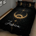 Black Wicca quilt blanket displayed on a bed with golden moon phases, stars, and cosmic celestial artwork